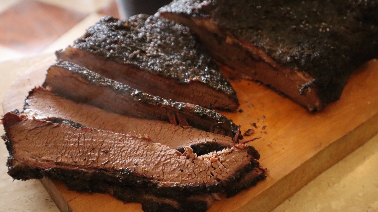 Image of Raw Tri-Tip "Freshly selected tri-tip roast with visible marbling and a fat cap, ready for dry brining
