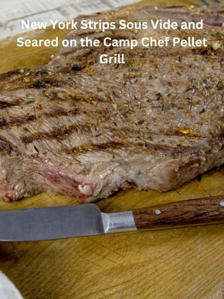 New York Strip Steak Sous Vide Preparation Camp Chef Pellet Grill Seared New York Strip Steak Perfectly Seared New York Strip on Pellet Grill Sous Vide New York Strip Steak in Vacuum-Sealed Bag Close-Up of Tender New York Strip Steak after Sous Vide Cooking Searing New York Strip Steak on Camp Chef Pellet Grill Juicy New York Strip Steak Ready to Serve New York Strip Steak with Crispy Exterior and Tender Interior