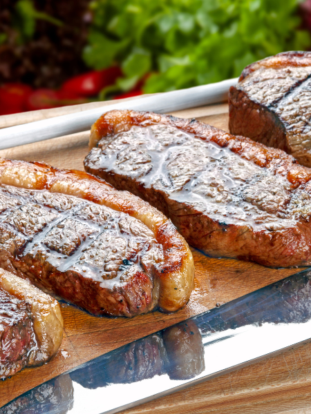 ALT text: "Raw picanha beef cut with signature fat cap, a tender and flavorful Brazilian sirloin cap steak