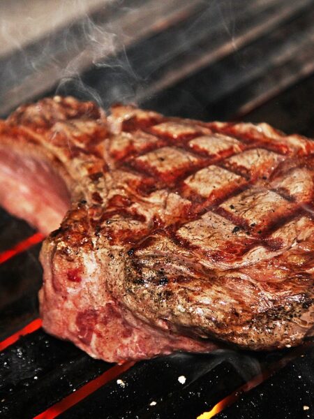 Image Alt Texts Raw Wagyu Tomahawk Ribeye Steak on a Wooden Cutting Board Seasoned Tomahawk Ribeye Steak with Salt, Pepper, and Herbs Tomahawk Steak on Grill Using the Reverse Sear Method Juicy Wagyu Tomahawk Ribeye Sizzling Over High Heat Flames Perfectly Seared Tomahawk Steak with Crispy Golden Brown Crust Cut Slices of Medium-Rare Wagyu Tomahawk Ribeye Showing Juicy Interior Reverse Seared Tomahawk Steak Served on a Plate with Garlic Butter and Herbs Close-up of Charred Crust on a Seared Tomahawk Steak Grilled Wagyu Tomahawk Steak Resting on a Cutting Board Before Slicing Ultimate Steak Dinner with Tomahawk Ribeye, Roasted Vegetables, and Garlic Butter