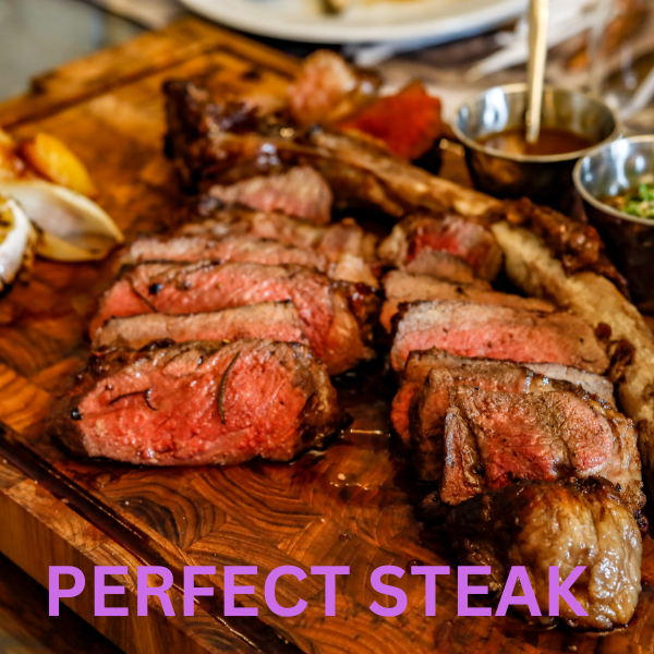 Perfectly seared steak in a cast iron skillet, sizzling with butter, garlic, and rosemary.
